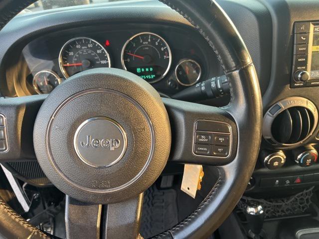 used 2015 Jeep Wrangler Unlimited car, priced at $16,299