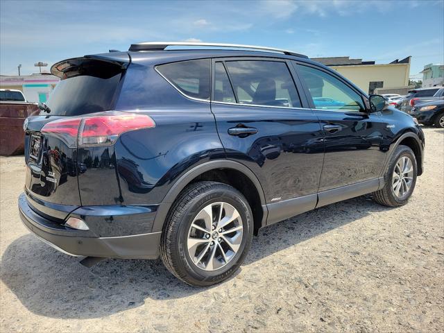 used 2018 Toyota RAV4 Hybrid car, priced at $23,550