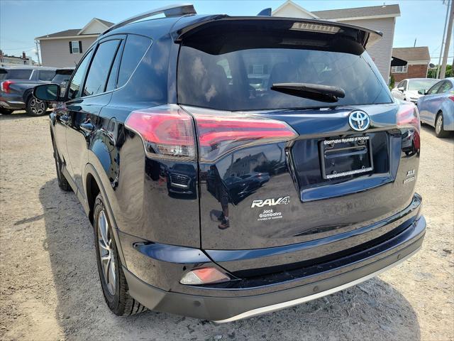 used 2018 Toyota RAV4 Hybrid car, priced at $23,550