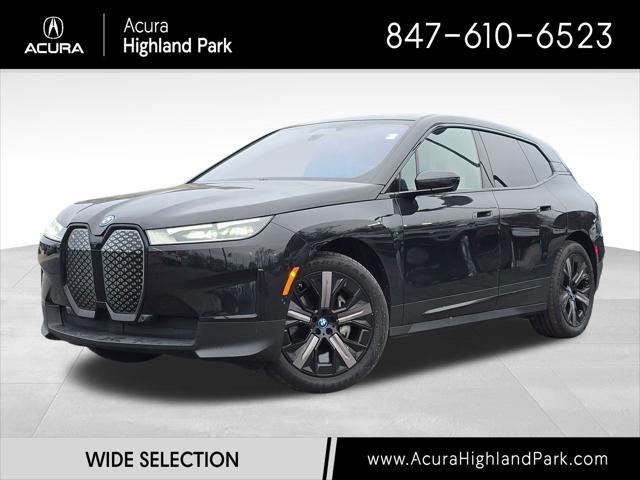 used 2024 BMW iX car, priced at $59,900