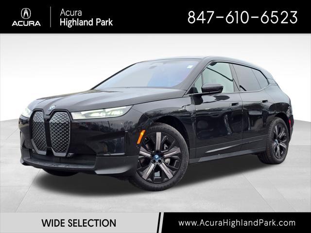 used 2024 BMW iX car, priced at $59,900