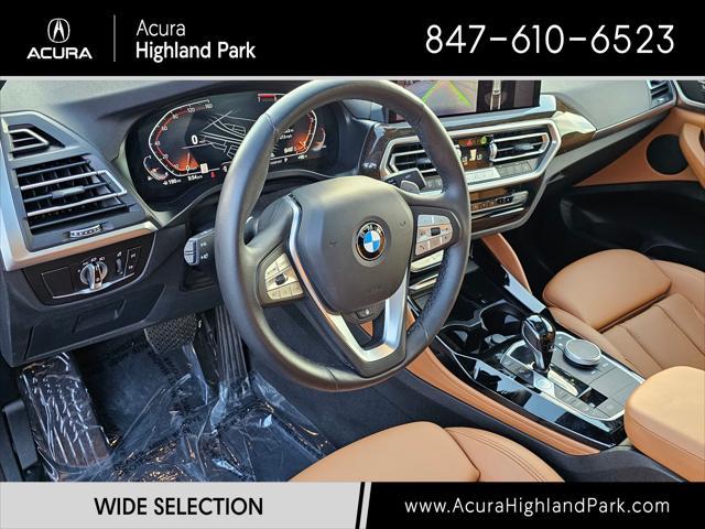 used 2022 BMW X4 car, priced at $39,750