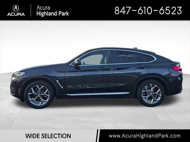 used 2022 BMW X4 car, priced at $39,750