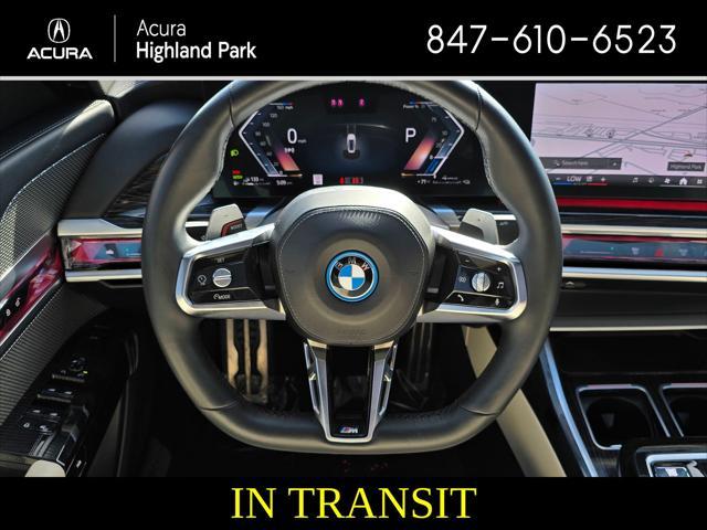 used 2024 BMW 750e car, priced at $79,990