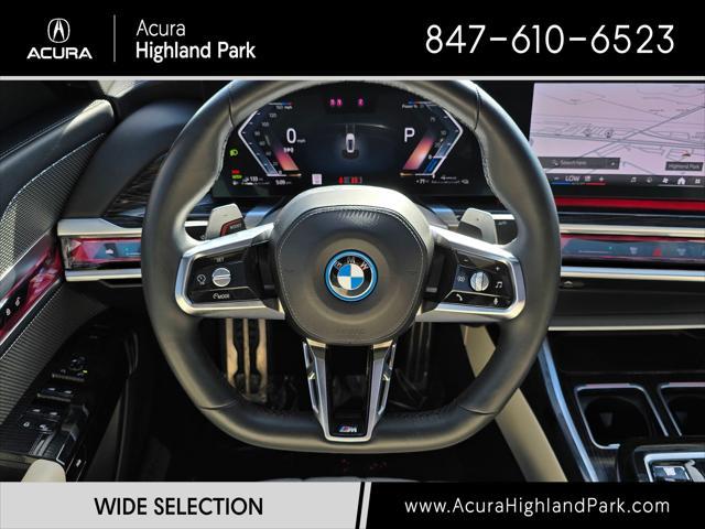 used 2024 BMW 750e car, priced at $79,990