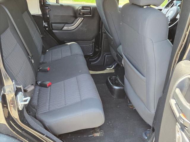 used 2012 Jeep Wrangler Unlimited car, priced at $12,995