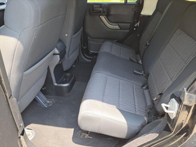 used 2012 Jeep Wrangler Unlimited car, priced at $12,995