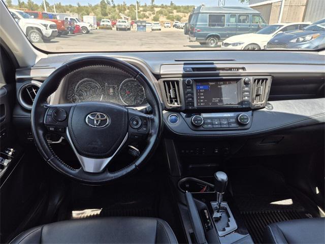 used 2018 Toyota RAV4 Hybrid car, priced at $26,874
