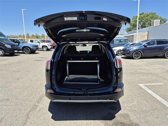 used 2018 Toyota RAV4 Hybrid car, priced at $26,874