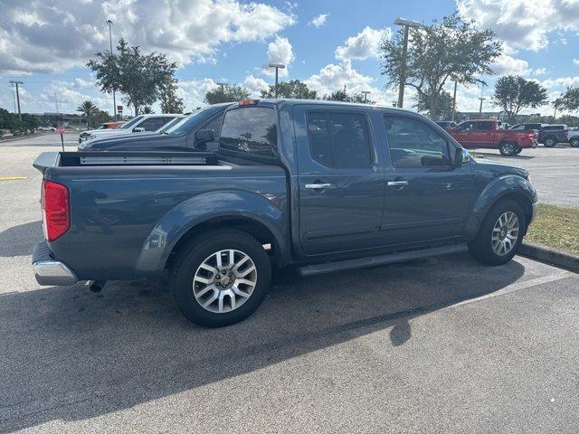 used 2013 Nissan Frontier car, priced at $15,900