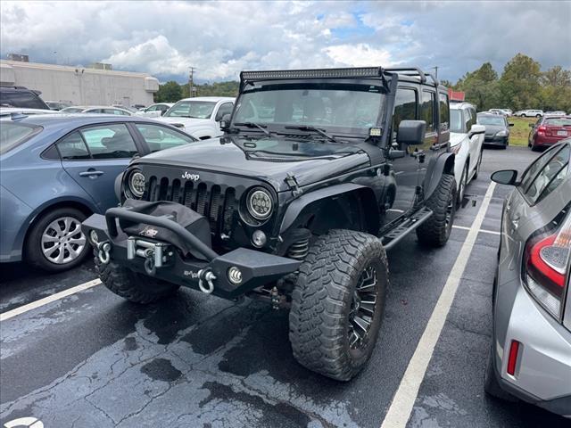 used 2014 Jeep Wrangler Unlimited car, priced at $18,997