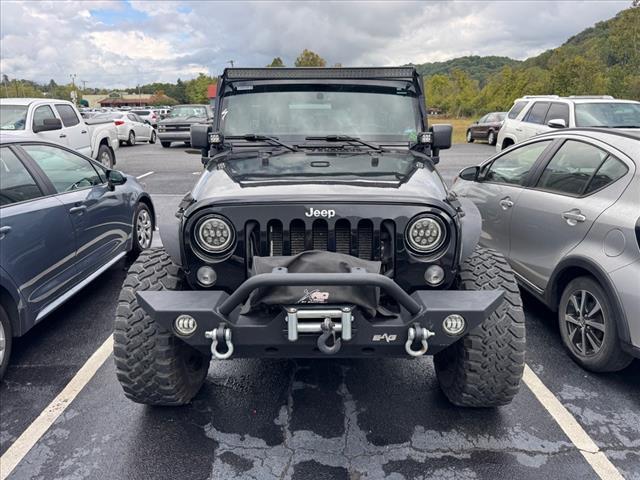 used 2014 Jeep Wrangler Unlimited car, priced at $18,997