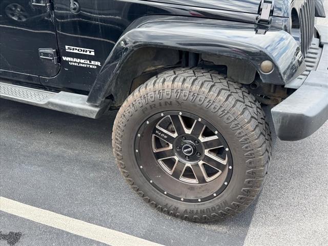 used 2013 Jeep Wrangler Unlimited car, priced at $15,997