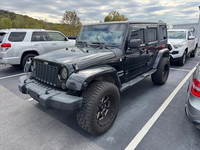 used 2013 Jeep Wrangler Unlimited car, priced at $15,997