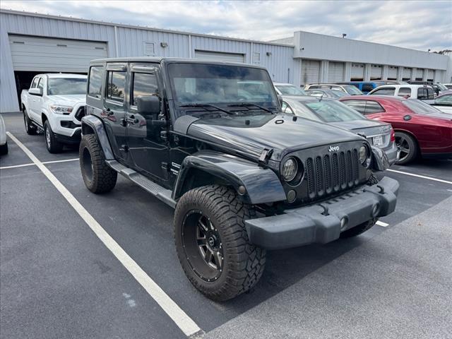 used 2013 Jeep Wrangler Unlimited car, priced at $15,997