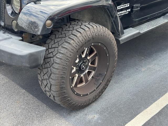 used 2013 Jeep Wrangler Unlimited car, priced at $15,997