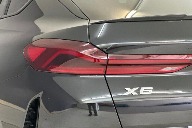 used 2023 BMW X6 car, priced at $58,999