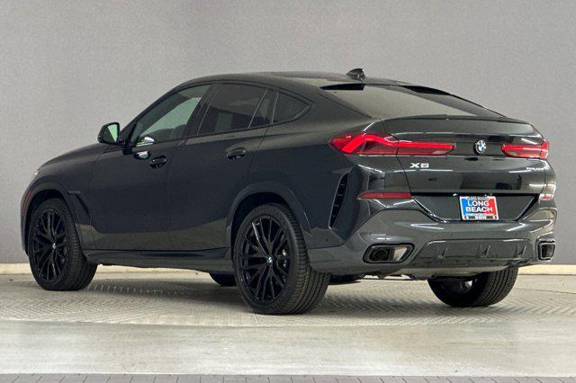 used 2023 BMW X6 car, priced at $58,999