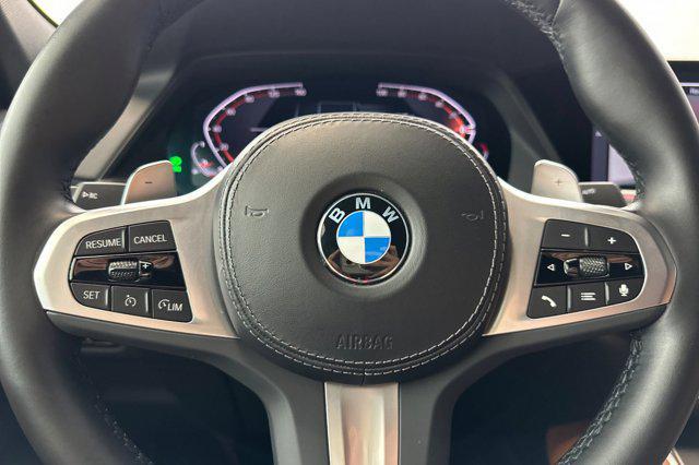 used 2023 BMW X6 car, priced at $58,999