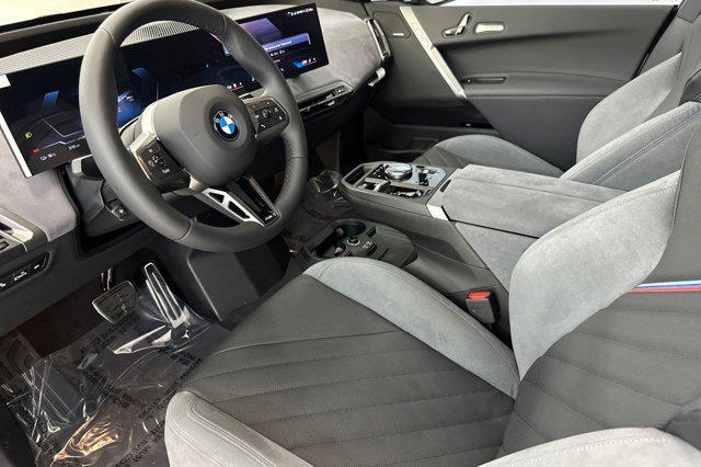 new 2026 BMW iX car, priced at $95,245