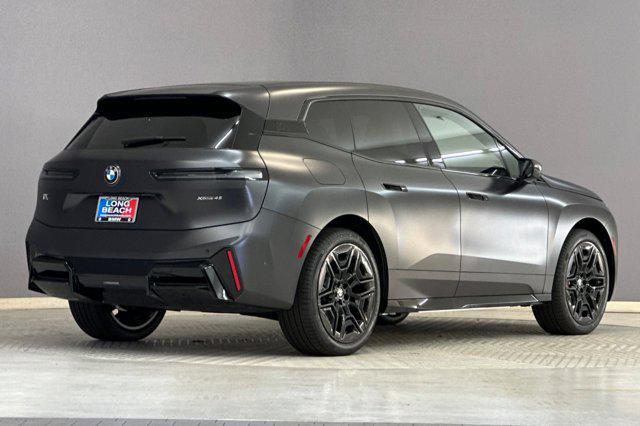 new 2026 BMW iX car, priced at $95,245