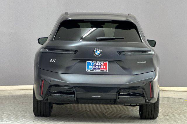 new 2026 BMW iX car, priced at $95,245