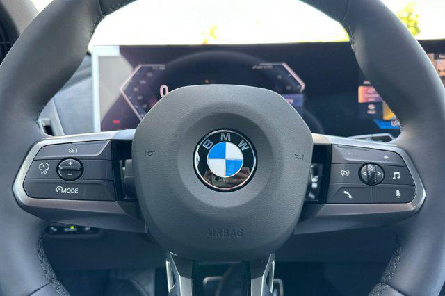 new 2026 BMW iX car, priced at $95,245