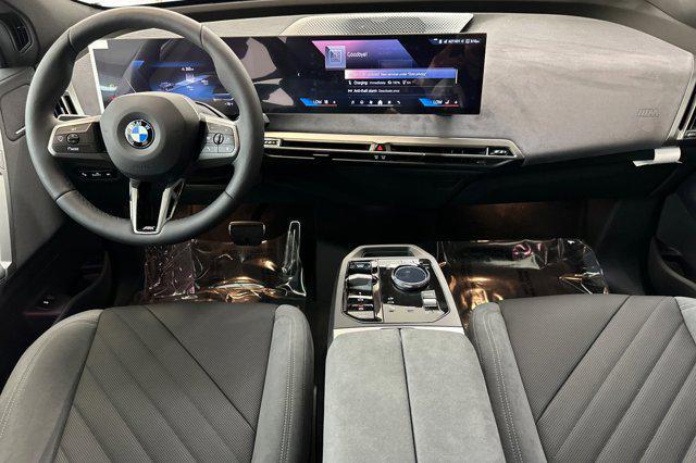 new 2026 BMW iX car, priced at $95,245