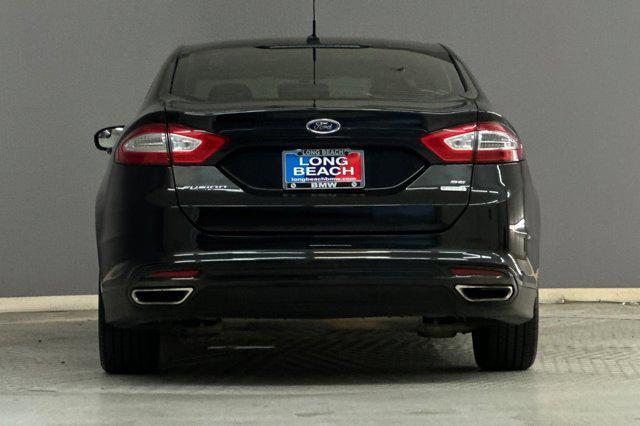 used 2014 Ford Fusion car, priced at $7,599