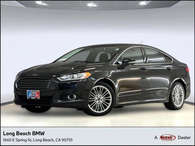 used 2014 Ford Fusion car, priced at $7,599