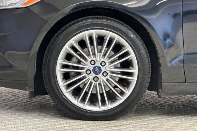 used 2014 Ford Fusion car, priced at $7,599