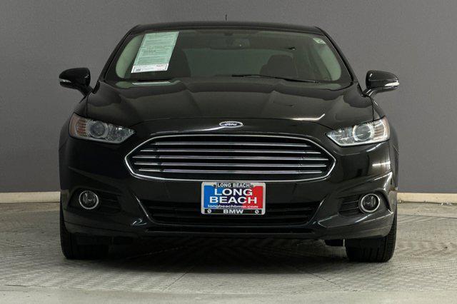 used 2014 Ford Fusion car, priced at $7,599