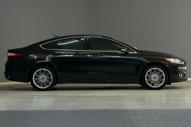 used 2014 Ford Fusion car, priced at $7,599