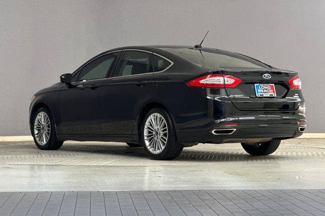 used 2014 Ford Fusion car, priced at $7,599