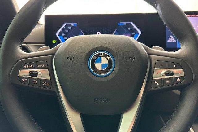 used 2023 BMW 330e car, priced at $29,697