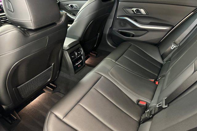 used 2023 BMW 330e car, priced at $29,697