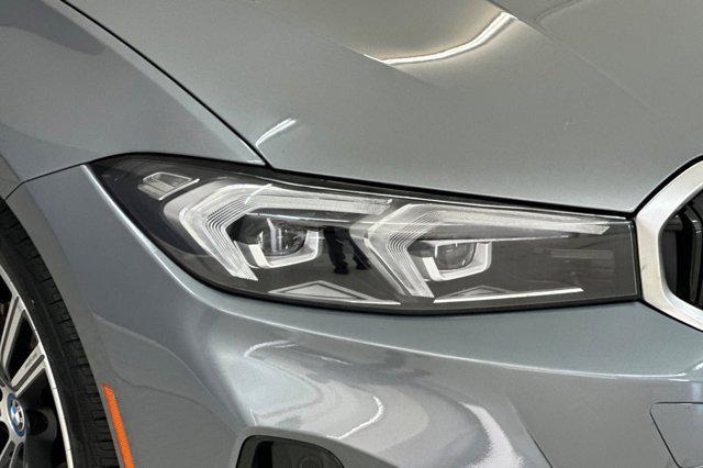 used 2023 BMW 330e car, priced at $29,697