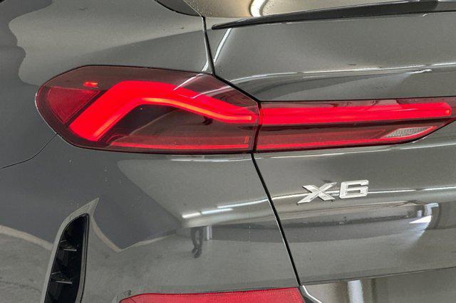 new 2026 BMW X6 car, priced at $90,870