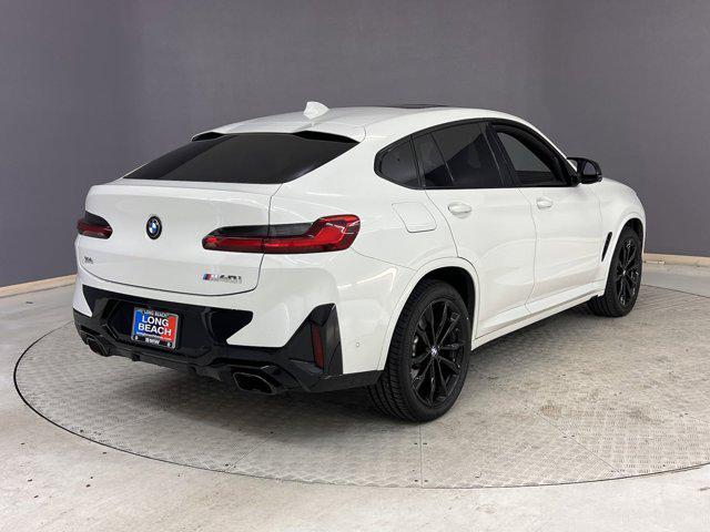 used 2022 BMW X4 car, priced at $47,998