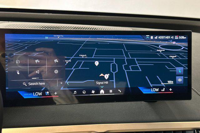 new 2026 BMW iX car, priced at $92,320