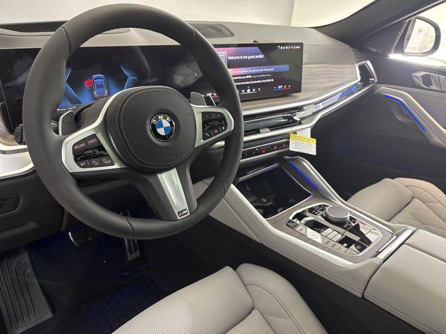 new 2025 BMW X6 car, priced at $82,940