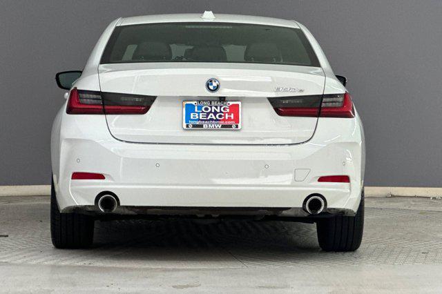 used 2023 BMW 330e car, priced at $29,998