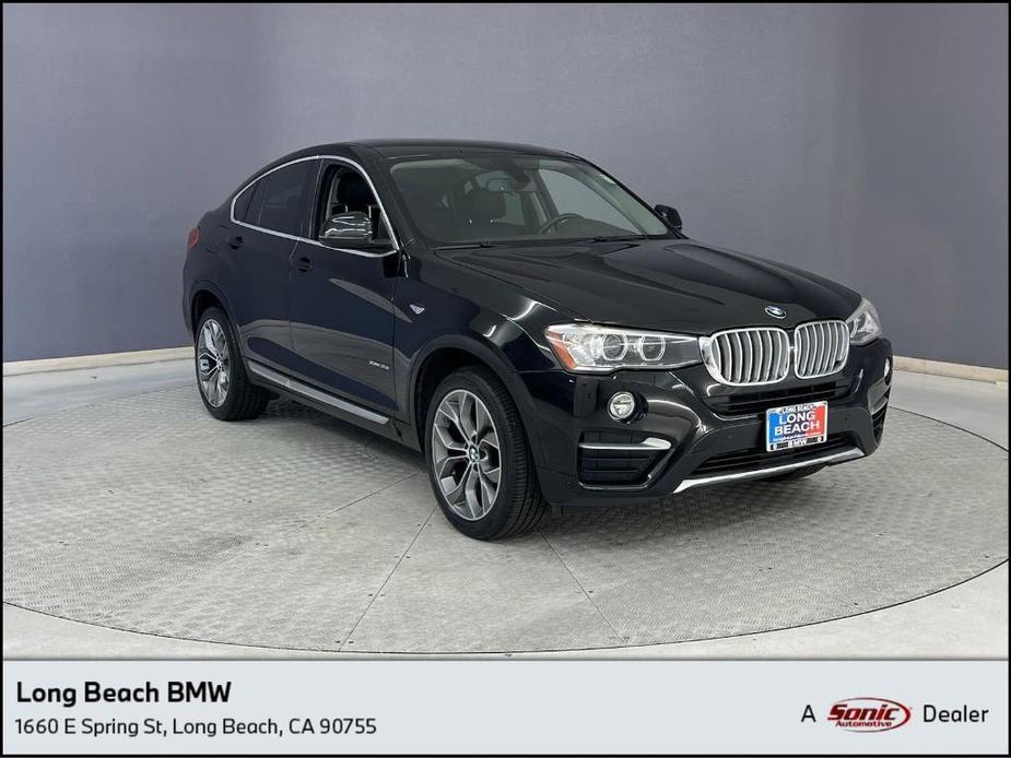 used 2015 BMW X4 car, priced at $14,998