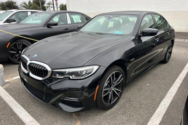 used 2022 BMW 330e car, priced at $31,999