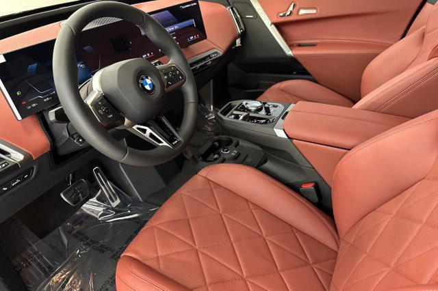 new 2026 BMW iX car, priced at $94,325