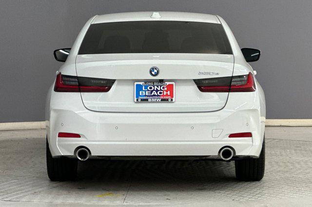 used 2023 BMW 330e car, priced at $34,598