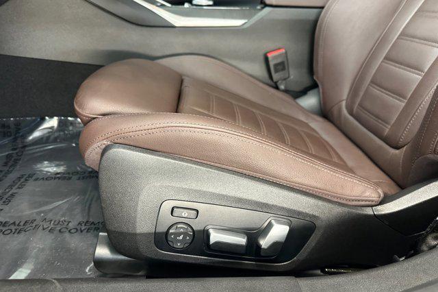 used 2023 BMW 330e car, priced at $34,598