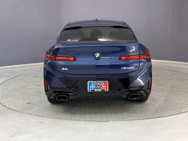 used 2024 BMW X4 car, priced at $58,997