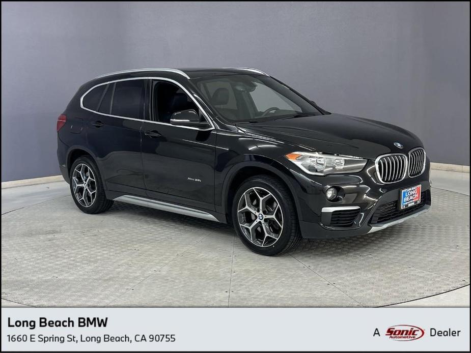 used 2018 BMW X1 car, priced at $19,299