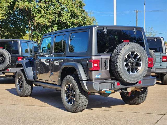 used 2024 Jeep Wrangler 4xe car, priced at $35,441